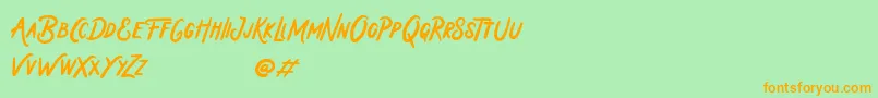 Holiday In Monday Font – Orange Fonts on Green Background