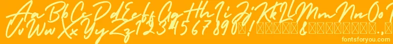 HolidayFree Font – Yellow Fonts on Orange Background