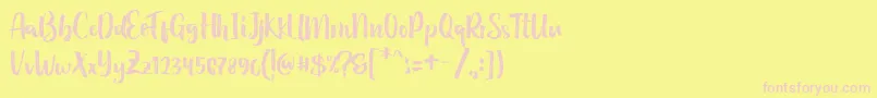 Holidays Handbrush Typeface Font – Pink Fonts on Yellow Background