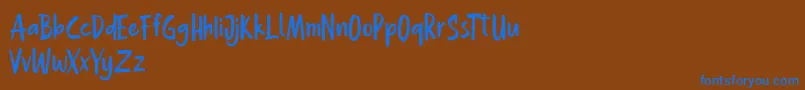 Hollaboi FREE Font – Blue Fonts on Brown Background