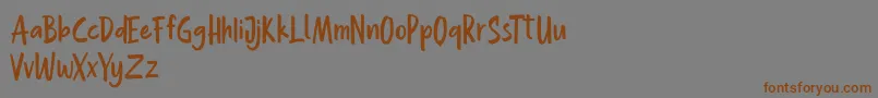 Hollaboi FREE Font – Brown Fonts on Gray Background