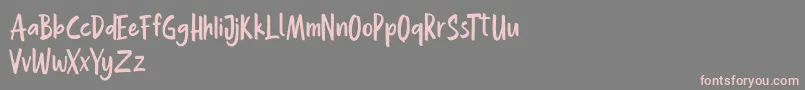 Hollaboi FREE-Schriftart – Rosa Schriften auf grauem Hintergrund