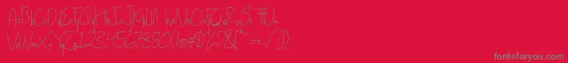 フォントHollen amare script   DEMO – 赤い背景に灰色の文字