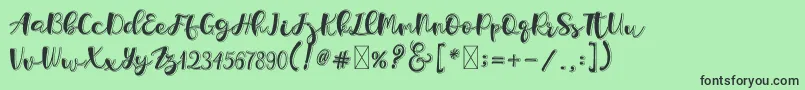 Holligrandina Font – Black Fonts on Green Background