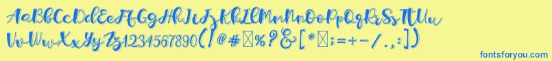 Holligrandina Font – Blue Fonts on Yellow Background