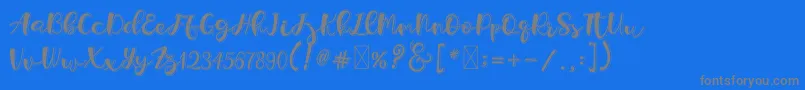 Holligrandina-Schriftart – Graue Schriften auf blauem Hintergrund