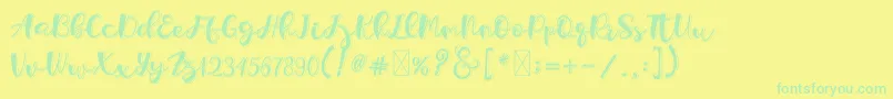 Holligrandina Font – Green Fonts on Yellow Background