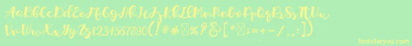 Holligrandina Font – Yellow Fonts on Green Background