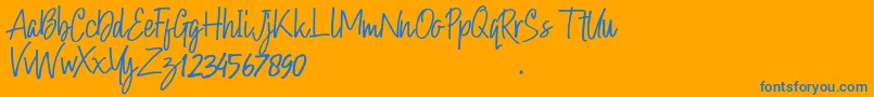 Hollybear Font – Blue Fonts on Orange Background