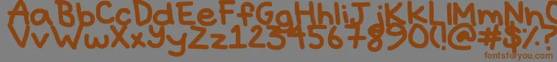 フォントHyperbole – 茶色の文字が灰色の背景にあります。