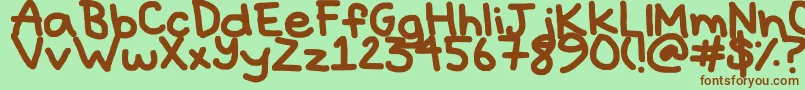 Hyperbole-fontti – ruskeat fontit vihreällä taustalla