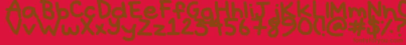 Hyperbole-fontti – ruskeat fontit punaisella taustalla