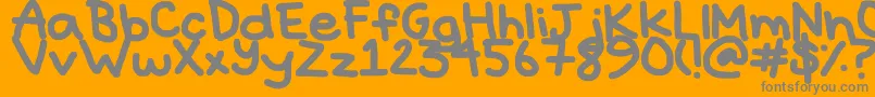 Hyperbole-fontti – harmaat kirjasimet oranssilla taustalla