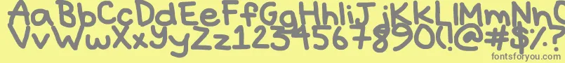 Hyperbole-fontti – harmaat kirjasimet keltaisella taustalla