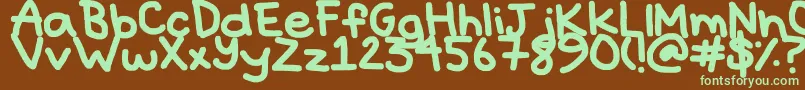 Hyperbole-fontti – vihreät fontit ruskealla taustalla