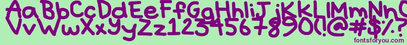 Hyperbole-fontti – violetit fontit vihreällä taustalla