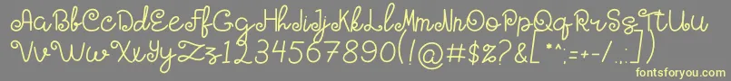 HOLY MOLLYN Font – Yellow Fonts on Gray Background