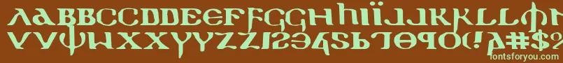 フォントHolyv2e – 緑色の文字が茶色の背景にあります。