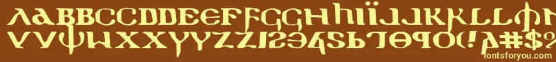 Holyv2e-fontti – keltaiset fontit ruskealla taustalla