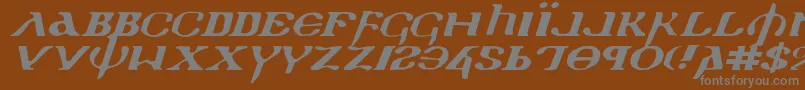 Holyv2ei-fontti – harmaat kirjasimet ruskealla taustalla