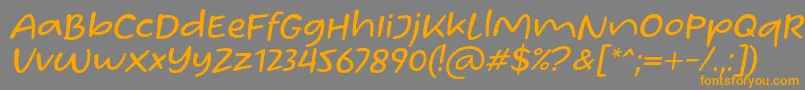 Czcionka Homade McRacken Slant Font by Situjuh 7NTypes – pomarańczowe czcionki na szarym tle