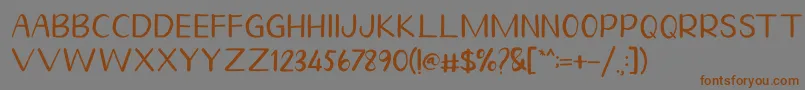 Шрифт Homegarden Sans – коричневые шрифты на сером фоне