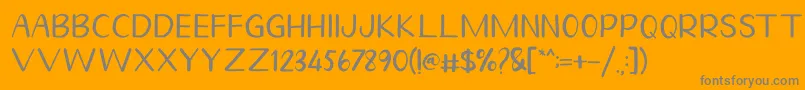 Homegarden Sans-fontti – harmaat kirjasimet oranssilla taustalla