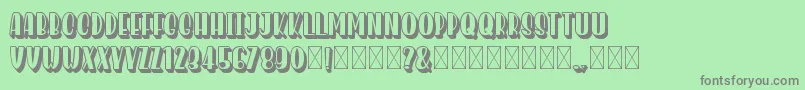 HomenuliShadow Font – Gray Fonts on Green Background