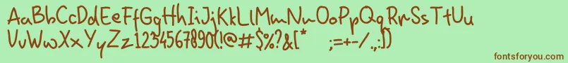 HominFun Font – Brown Fonts on Green Background