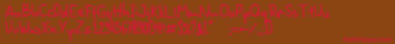 HominFun Font – Red Fonts on Brown Background