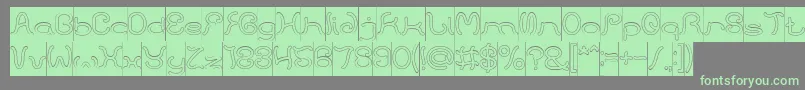 HONESTLY HOLLOW INVERSE-Schriftart – Grüne Schriften auf grauem Hintergrund