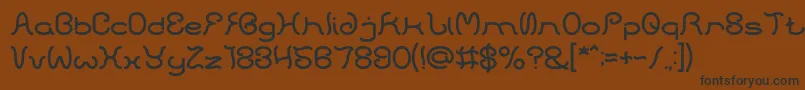 フォントHONESTLY – 黒い文字が茶色の背景にあります