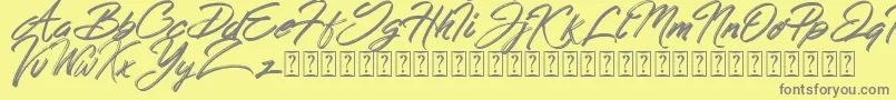 Hong Kong Script Brush-Schriftart – Graue Schriften auf gelbem Hintergrund