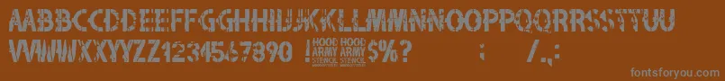 Hood Army Stencil-Schriftart – Graue Schriften auf braunem Hintergrund