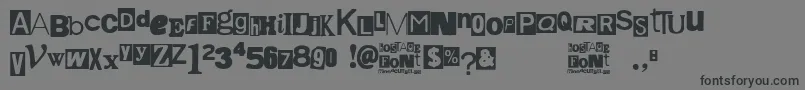 フォントHostage – 黒い文字の灰色の背景