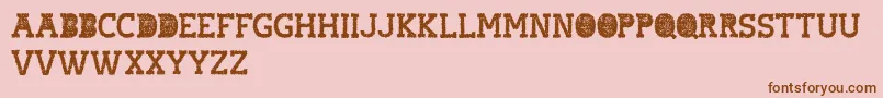 Czcionka hostile headline – brązowe czcionki na różowym tle