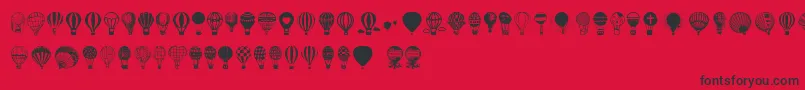 Шрифт Hot Air Balloons – чёрные шрифты на красном фоне