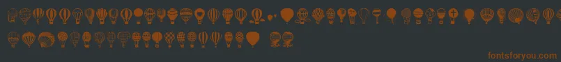 Hot Air Balloons-Schriftart – Braune Schriften auf schwarzem Hintergrund