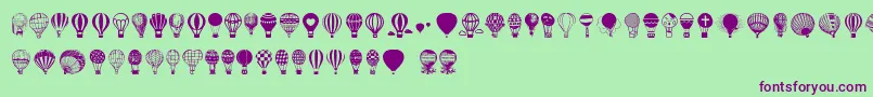 Hot Air Balloons-Schriftart – Violette Schriften auf grünem Hintergrund