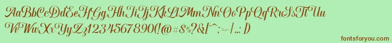 Fonte Hougbon Script – fontes marrons em um fundo verde