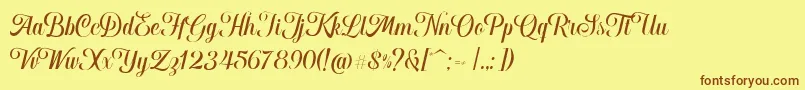 Hougbon Script Font – Brown Fonts on Yellow Background