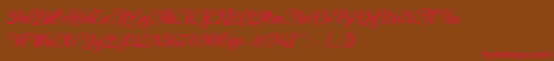 フォントHougbon Script – 赤い文字が茶色の背景にあります。