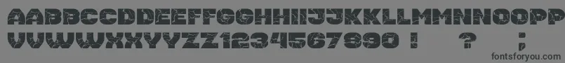 フォントHousebreak ExtGrunged – 黒い文字の灰色の背景