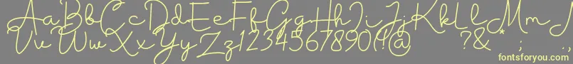 Шрифт Housttik Personal Use – жёлтые шрифты на сером фоне