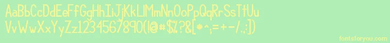 Kgcompassionbig Font – Yellow Fonts on Green Background