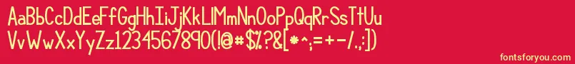 フォントKgcompassionbig – 黄色の文字、赤い背景