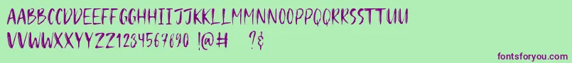 Hugos Font – Purple Fonts on Green Background