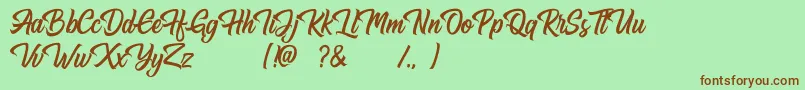 Hugtophia Font – Brown Fonts on Green Background