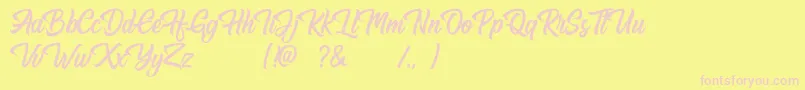 Hugtophia-Schriftart – Rosa Schriften auf gelbem Hintergrund