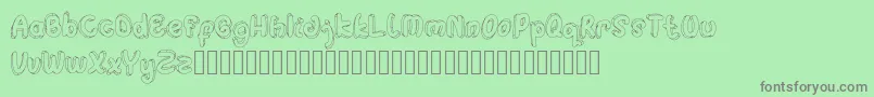 Hulahop Font – Gray Fonts on Green Background